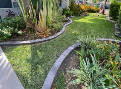Modern clean-lined concrete landscape edge showing sleek minimal definition